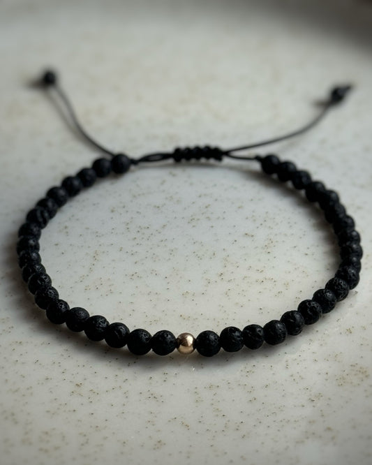 Bransoletka męska ze złotą kulką