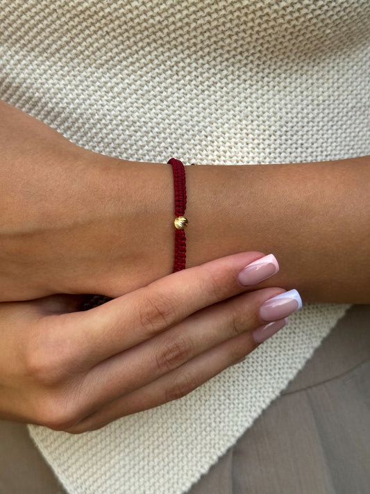 Bransoletka ze złotą kulką