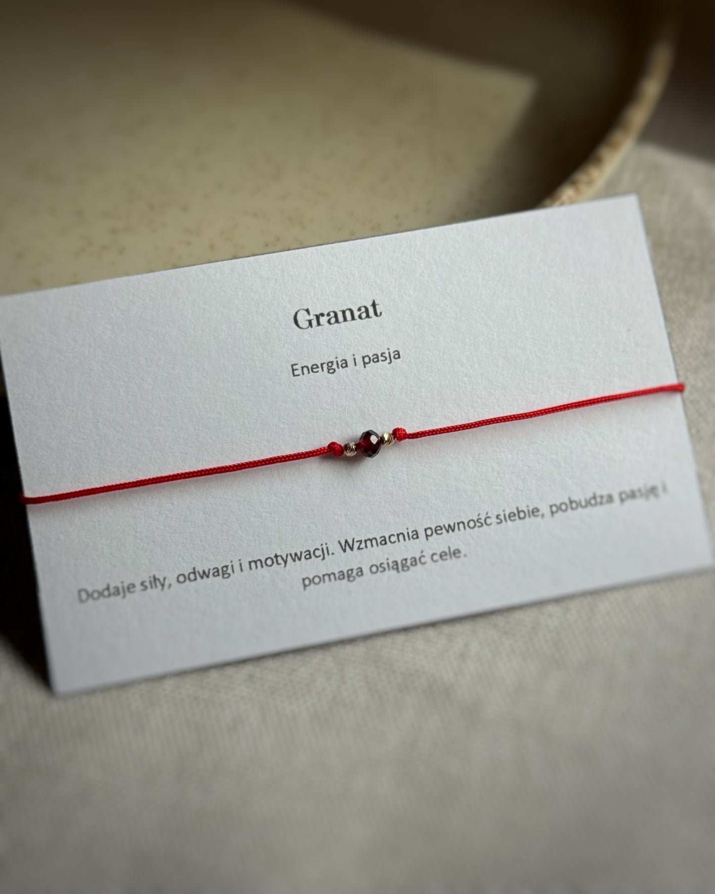 Bransoletka złota z granatem